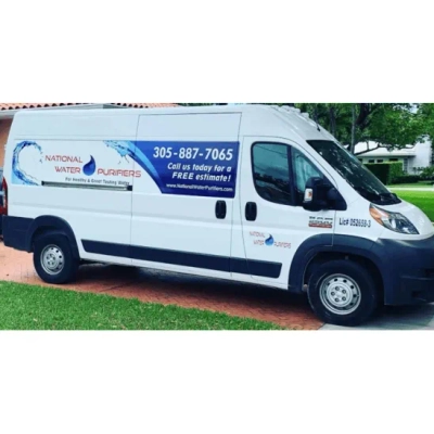 National Water Purifiers branded service van featuring the company logo, contact number, and a large blue water splash graphic