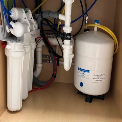 Professional multi-stage residential reverse osmosis purification bundle configured with carbon pre-filters and a semi-permeable membrane assembly, supplied by Alleghany Mechanical Services
