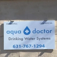 Aqua Doctor logo and sign for professional residential & commercial drinking water systems services