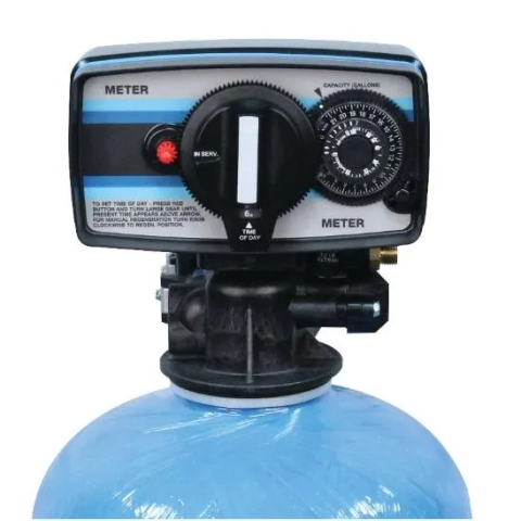 Aqua Masters Inc. water softener meter control head on a blue fiberglass mineral pressure tank.