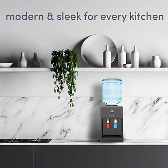 Avalon Top Loading Desktop Water Dispenser perfectly complements the design of the kitchen.