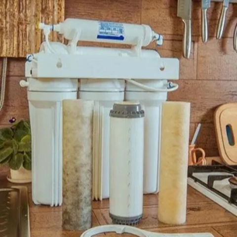 Under-sink reverse osmosis filtration maintenance and filter replacement in Boerne, Texas.
