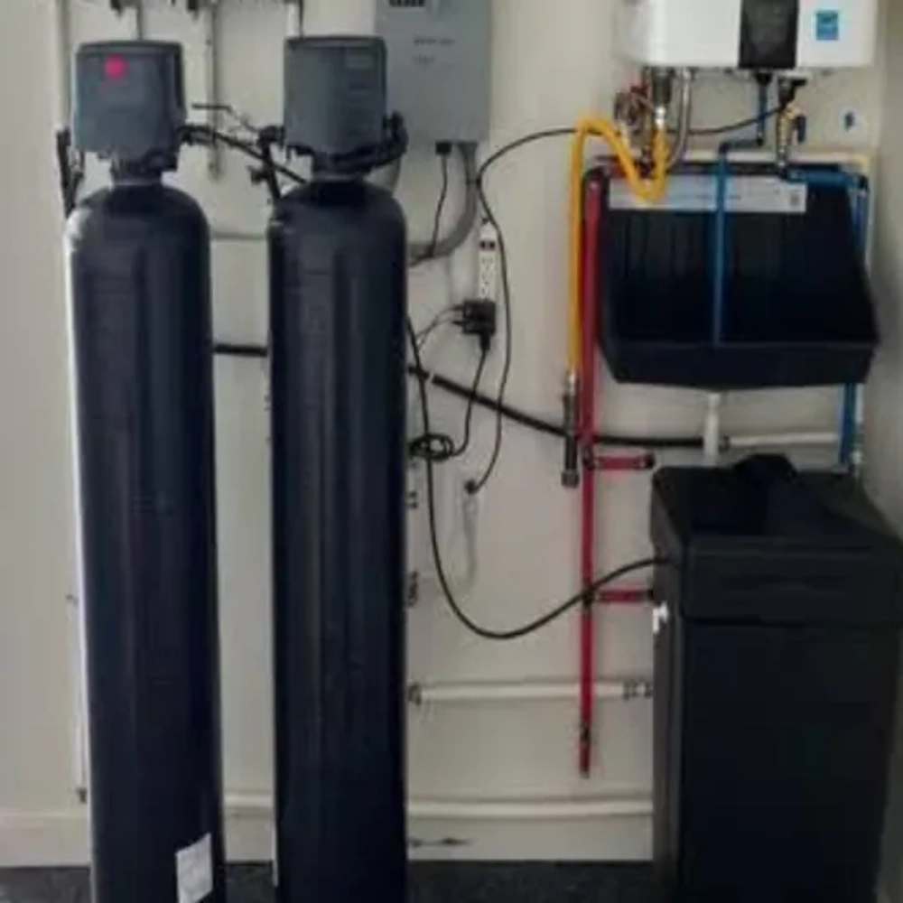 Brockelman's Water Services integrated dual-tank system for advanced mineral softening and iron filtration