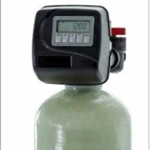 Clack WS1 Series water softener control head, black digital valve with time and status display.