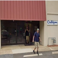 Culligan of Charlotte office entrance in NC, specializing in water softeners and bottled water.