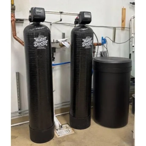 Dallas Water Doctor dual whole house water filtration and softening systems with brine tank.