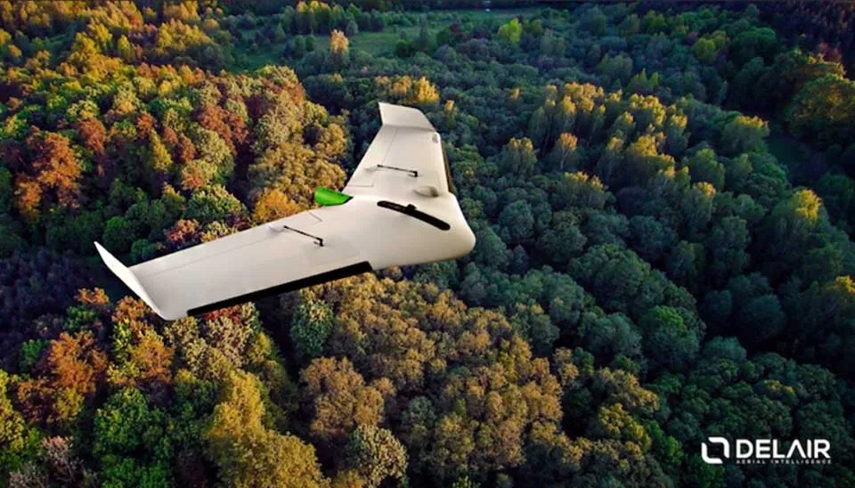 Delair UX 11 fixed-wing drone.  Photo shows its robust build, long wings. Used for mapping, surveying water resources.