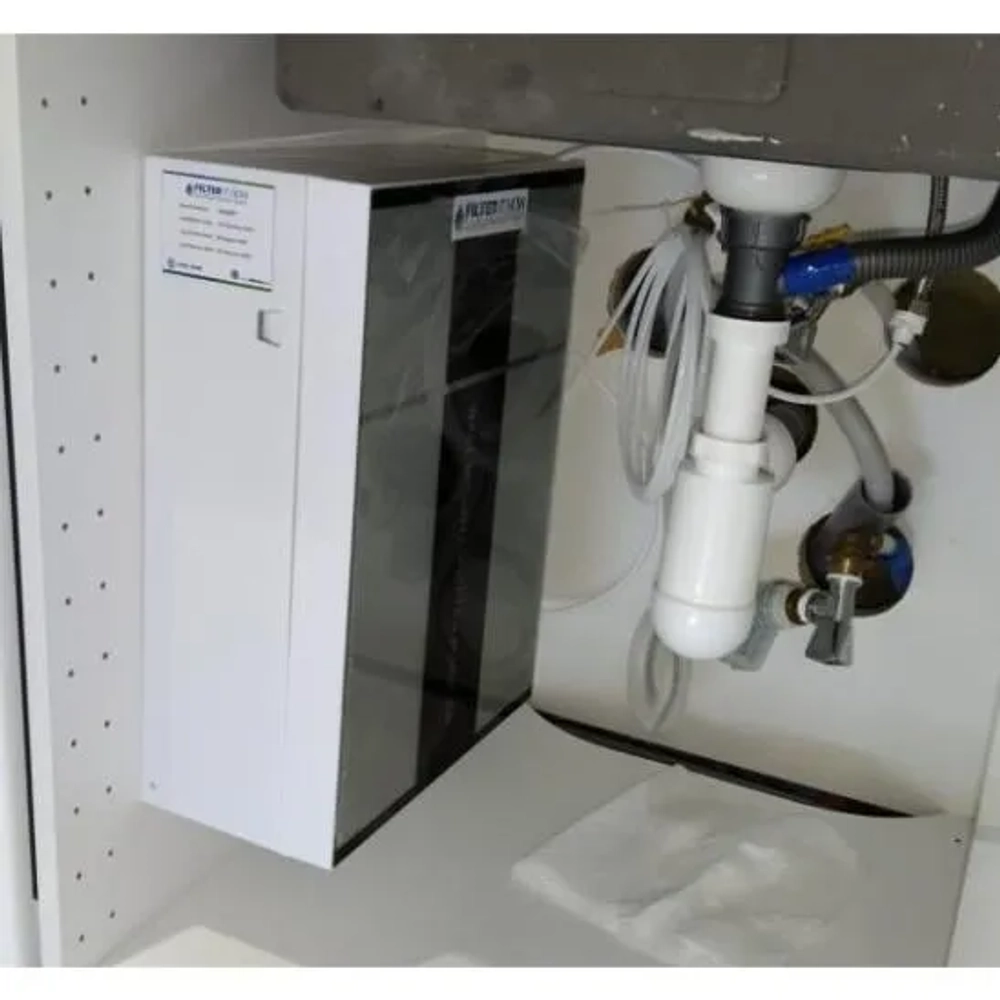 Installed Filter It Now undersink UF water purifier with space-saving tankless design for fresh and safe drinking water