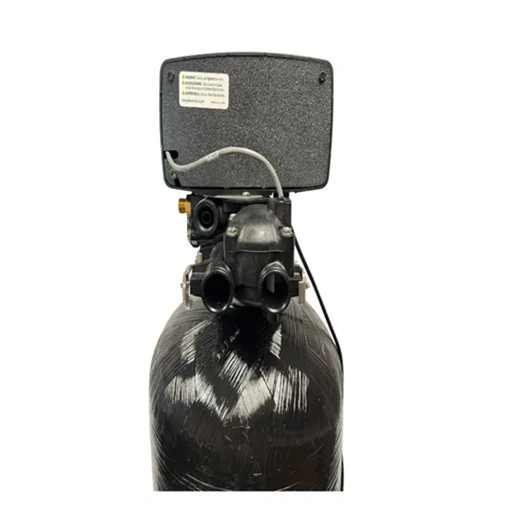Black Fleck 5600SXT metered control valve with digital screen for water softening systems.