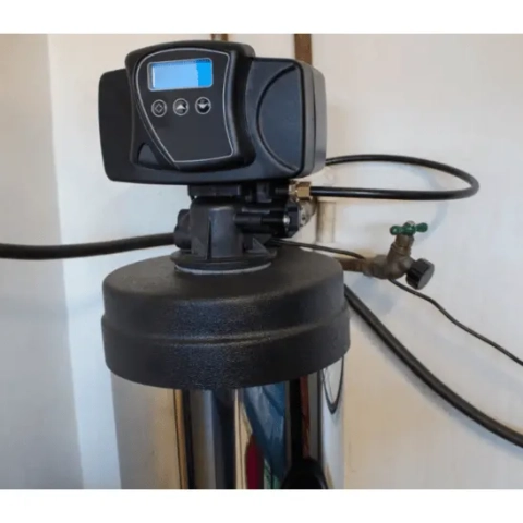 Frank Gay Services residential water softener installation featuring a high-efficiency digital control valve