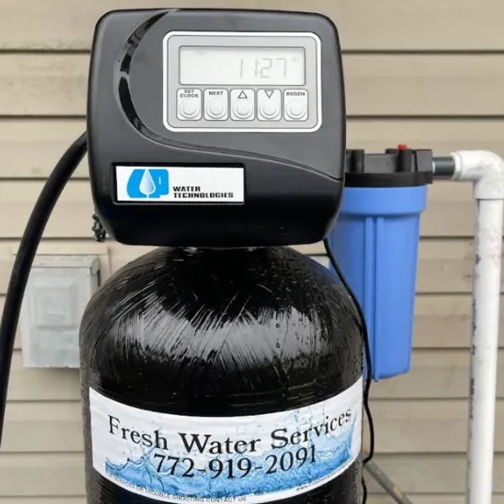 Fresh Water Services Inc. residential water softener featuring an advanced Fleck control valve for hard water removal