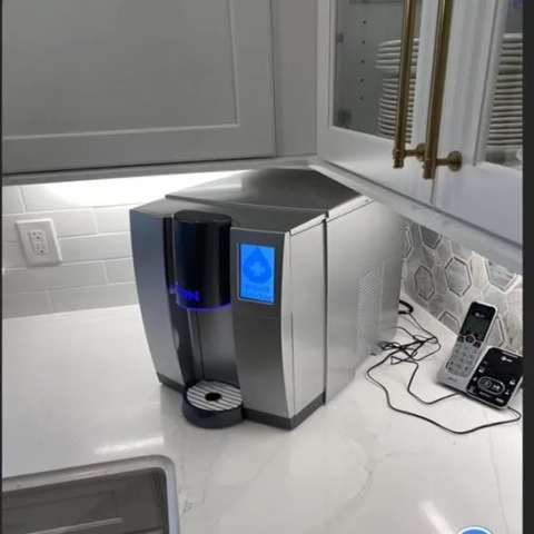 Aqua Select water dispenser, providing instant filtered hot, cold, and customizable seltzer/sparkling water on demand.