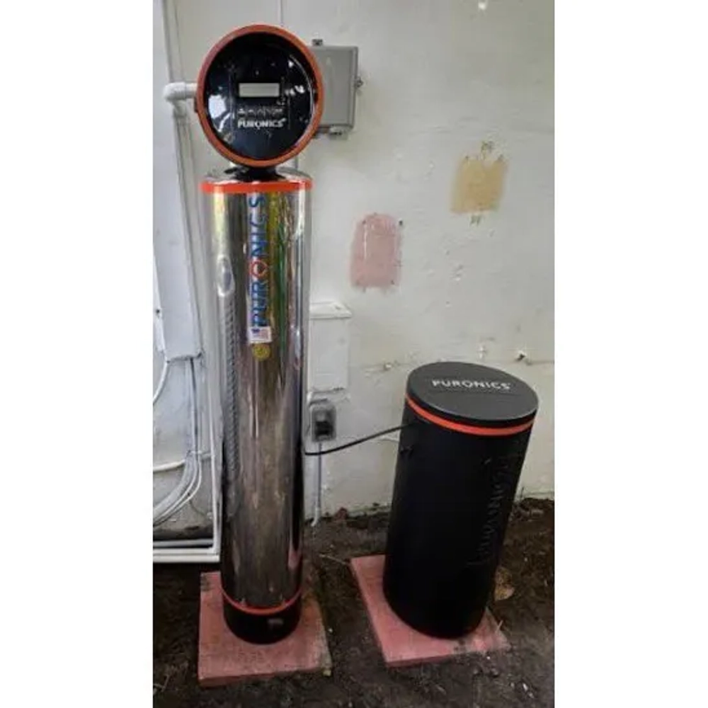 Heavy-duty Hydrality water filtration system installed outside for high-capacity residential use