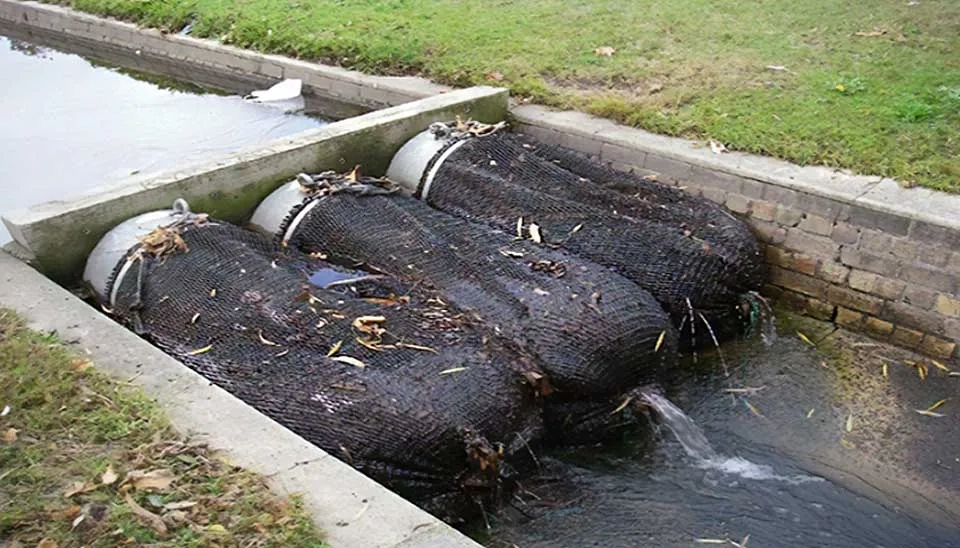 Image showing drainage net setup to capture debris from drainage flow, installed at pipe exit.