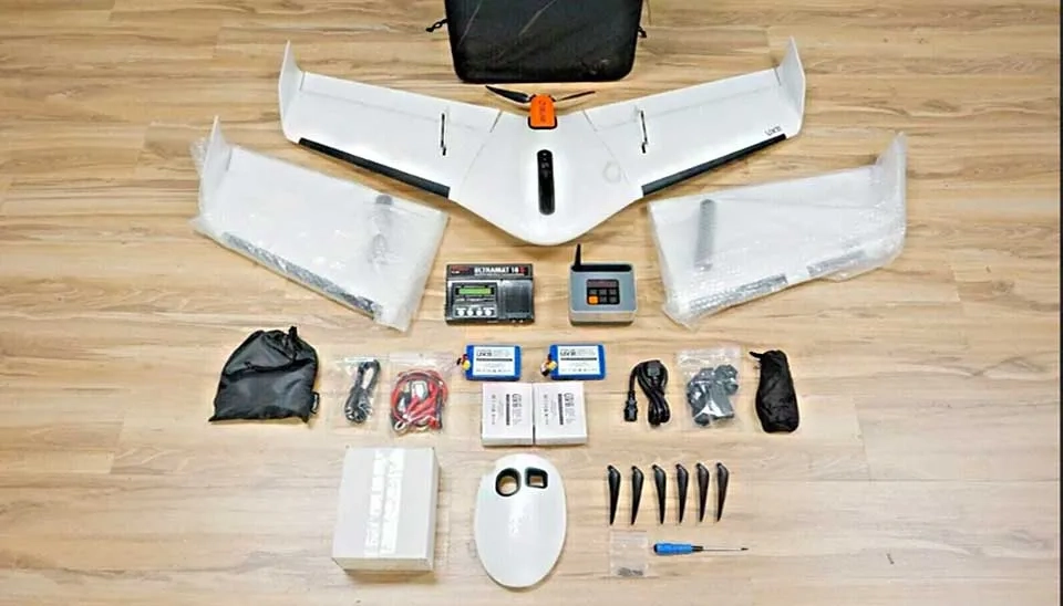 Diagram of Delair UX 11 drone parts.  Labels highlight internal structure, external components. Illustrates modular design