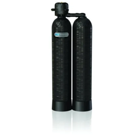 Black Kinetico twin-tank water softener showing the head unit and two mineral tanks.