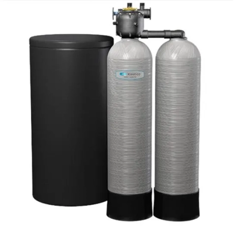 Kinetico two-tank water treatment system with separate salt tank for efficient softening. 