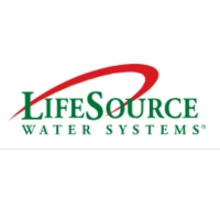 LifeSource Water Systems logo featuring a bold green serif wordmark and a sweeping red arc, representing premium salt-free whole-house water filtration