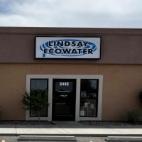  Lindsay EcoWater storefront sign, representing the local dealer offering whole-home water softeners and filters.