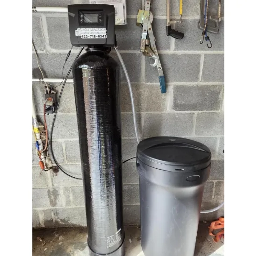 NOVO Professional Water System installed against a concrete block wall for whole-house water.