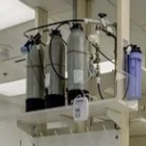 Professional point-of-use commercial reverse osmosis and mixed-bed deionization loop with a digital water quality indicator panel, expertly engineered by Neu Ion Inc