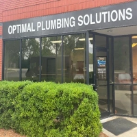 Optimal Plumbing Solutions storefront in Raleigh, offering residential and commercial plumbing.