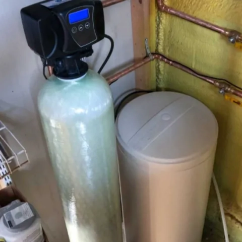 Professional point-of-entry residential water conditioning system neatly installed with structured bypass piping to eliminate heavy calcium scale and hard water minerals, expertly delivered by Plumbing Pro Services Germantown
