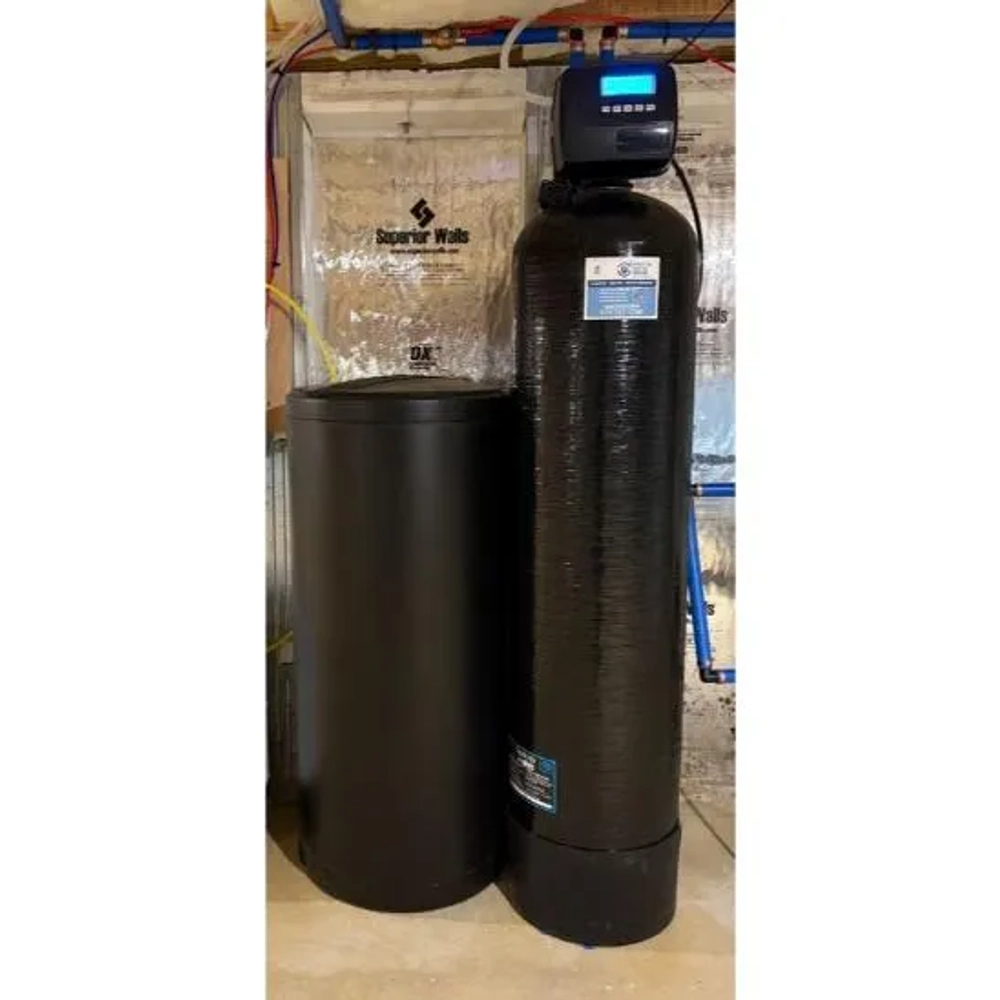 Prestige Water Group installed black residential water softener system with brine tank and digital control head.