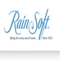RainSoft logo featuring a flowing sky-blue script wordmark with an embedded water drop icon in the letter "S" above the tagline "Taking the worry out of water... Since 1953"