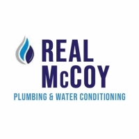 The official logo for Real McCoy Plumbing, offering water conditioning and plumbing services in New Jersey.