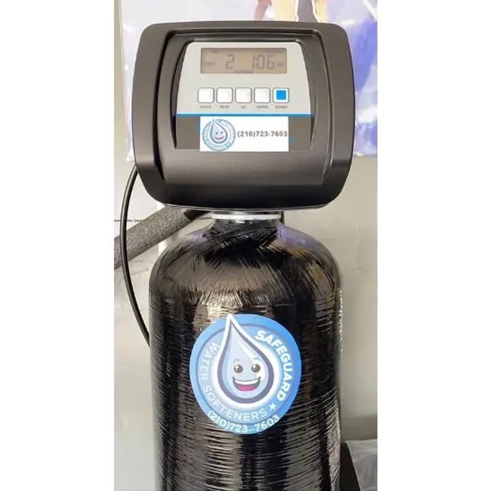Close-up of a Safeguard Water Softener digital control valve and 210-723-7603 contact info.