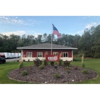Belding-based Scheid Plumbing, Heating & Cooling Inc. building specializing in residential HVAC care.