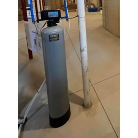 Seiter Services water softening unit installed in a basement for whole-home water conditioning and scale prevention.