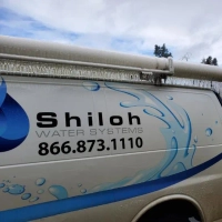 Van for Shiloh Water Systems, providing water softening, filtration, and repair services in the Pacific Northwest region.