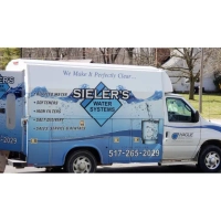 Sieler's Water Systems truck in Adrian, Michigan, advertising bottled water, softeners, iron filters, salt delivery.