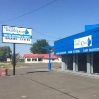 Sippel Water Care storefront and sign advertising water systems, filtration, pump systems, and rain harvest solutions.
