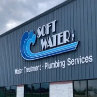 Soft Water Inc storefront building logo offering expert water treatment and plumbing services