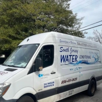 South Jersey Water Conditioning van for water treatment, showing 24 Hour Service and contact number.