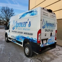 Spencer's Soft Water van with services: Water Softeners, Reverse Osmosis, and Salt Delivery.