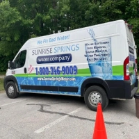 Sunrise Springs Water van detailing services: softeners, iron/sulfur removal, salt delivery.