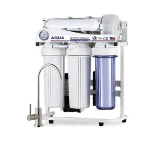 Tareeq LLC 5-stage reverse osmosis water filter system with clear housings and a storage tank.