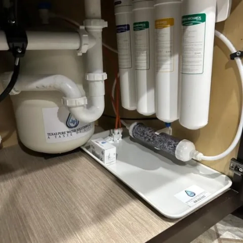 5-stage reverse osmosis water purification system with storage tank by Texas Pure Water Solutions.