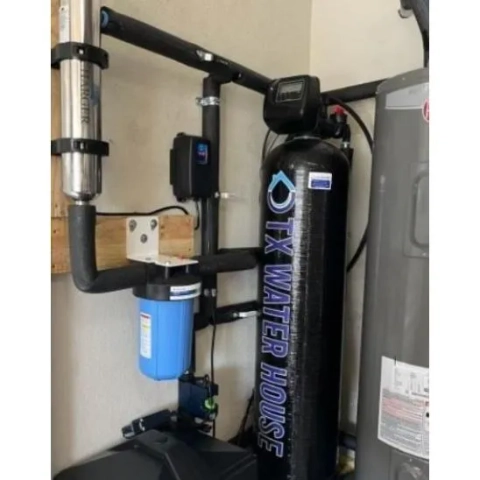 Professional TX Water House filtration installation featuring a sediment filter and softener