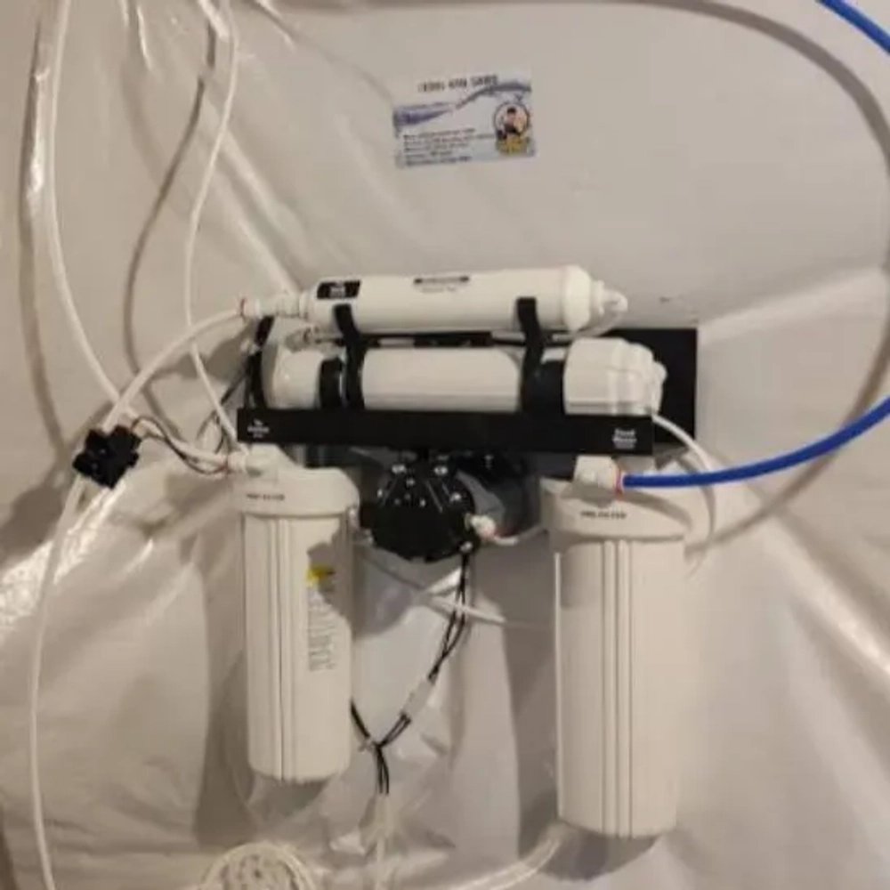Reverse Osmosis water purifier from The Softener Guy, featuring a membrane and three vertical pre-filters.