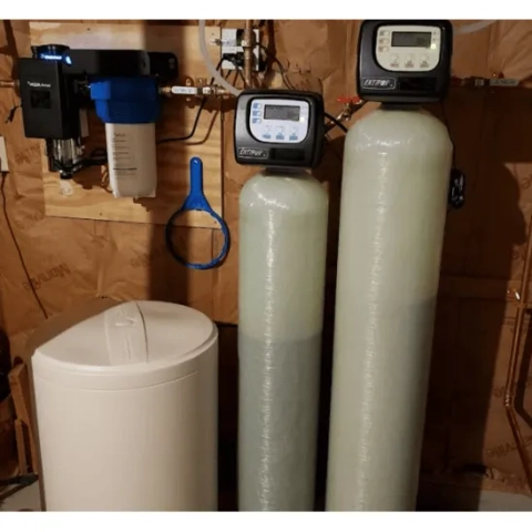 Tyler Water Systems whole-house water softener setup with dual mineral tanks and filtration system