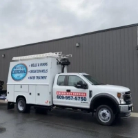Water Central service truck offering wells, pumps, irrigation, and water treatment services in New Jersey.