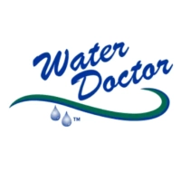 Water Doctor logo featuring a stacked royal blue script wordmark over a blue-to-green swooping wave underline and two falling water droplets on a white background