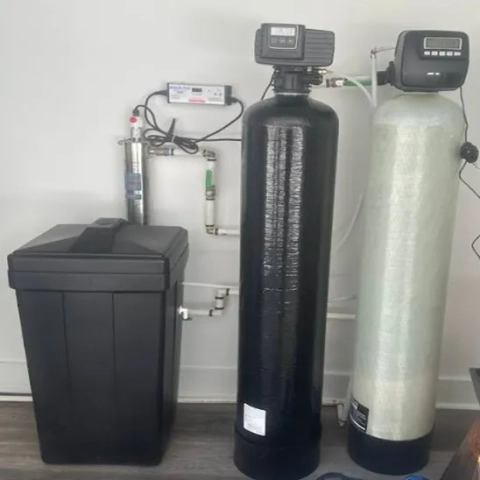 Lifetime Water Systems whole home water softener and filtration system installed in a laundry room