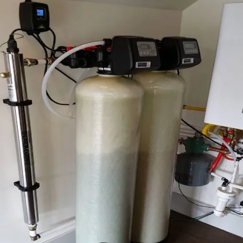 Dual tank water softener system by Mountain Water Systems with Blackcomb UV sterilizer.