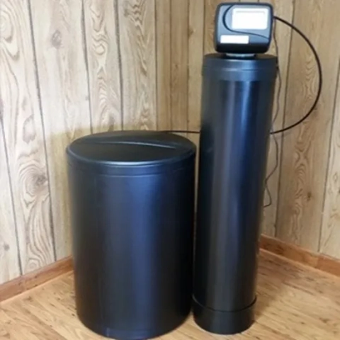 Black Schaefer's Soft Water softener system with a tall mineral tank, digital valve, and brine tank.